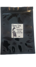 Front view of Queen Tee's Premium Third Eye herbal loose leaf tea blend in a clear glass jar with a label.