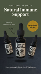 Black cumin seed tincture in a glass dropper bottle labeled Queen Tee's Herbal Teas and Tinctures.