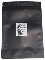 Loose hibiscus tea bag from Queen Tee's Premium Hibiscus Loose Leaf Tea, showcasing vibrant dried hibiscus petals.