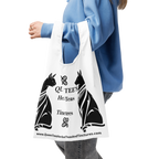 Queen Tee's Herbal Teas and Tinctures shopping bag with all-over herbal print, black background, reusable accessory for tea lovers.