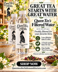 Brio Filtered Water 16oz bottle with a clear body, white Queen Tee’s Herbs label, and black tea-themed graphics