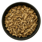 Loose Queen Tee's Premium Marshmallow Root Cut tea leaves from Queen Tee's Herbal Teas and Tinctures, ready for brewing.