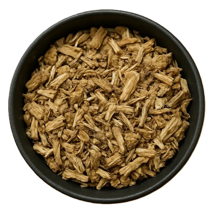 Loose Queen Tee's Premium Marshmallow Root Cut tea leaves from Queen Tee's Herbal Teas and Tinctures, ready for brewing.
