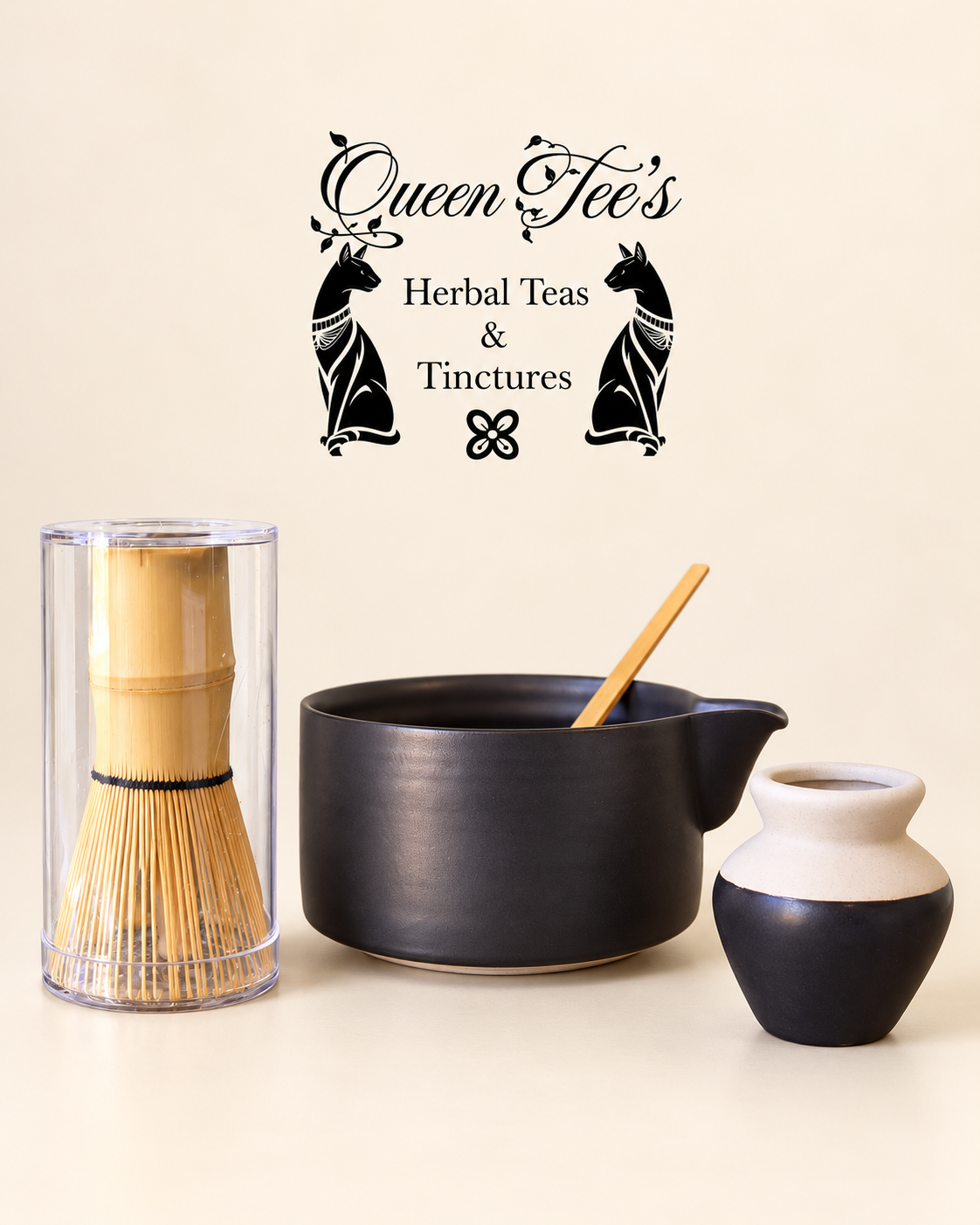 Japanese Matcha Whisk set with a bamboo whisk in a clear holder, dark ceramic pouring bowl, and matching holder